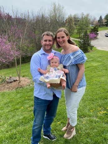 Myla Davis with her parents who honeymooned with us in November of 2020.  Their special story is shared on our blog about Bucuti Babies